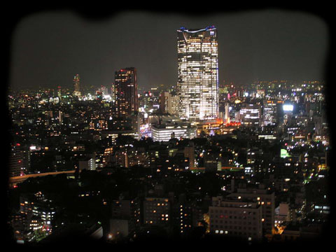 Exotic Dancing in Japan. Recruiting information for exotic dancers and hostesses from around the world for clubs in Tokyo, Japan. The Mori building in Roppongi at night.